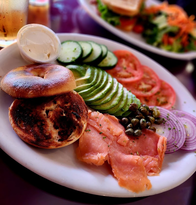 Bagel, smoked salmon, avocado and breakfast at V Boulevard Café