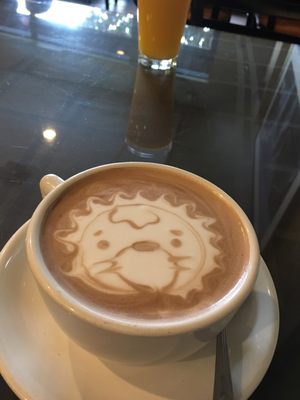 Latte art in a cup at V Boulevard Café